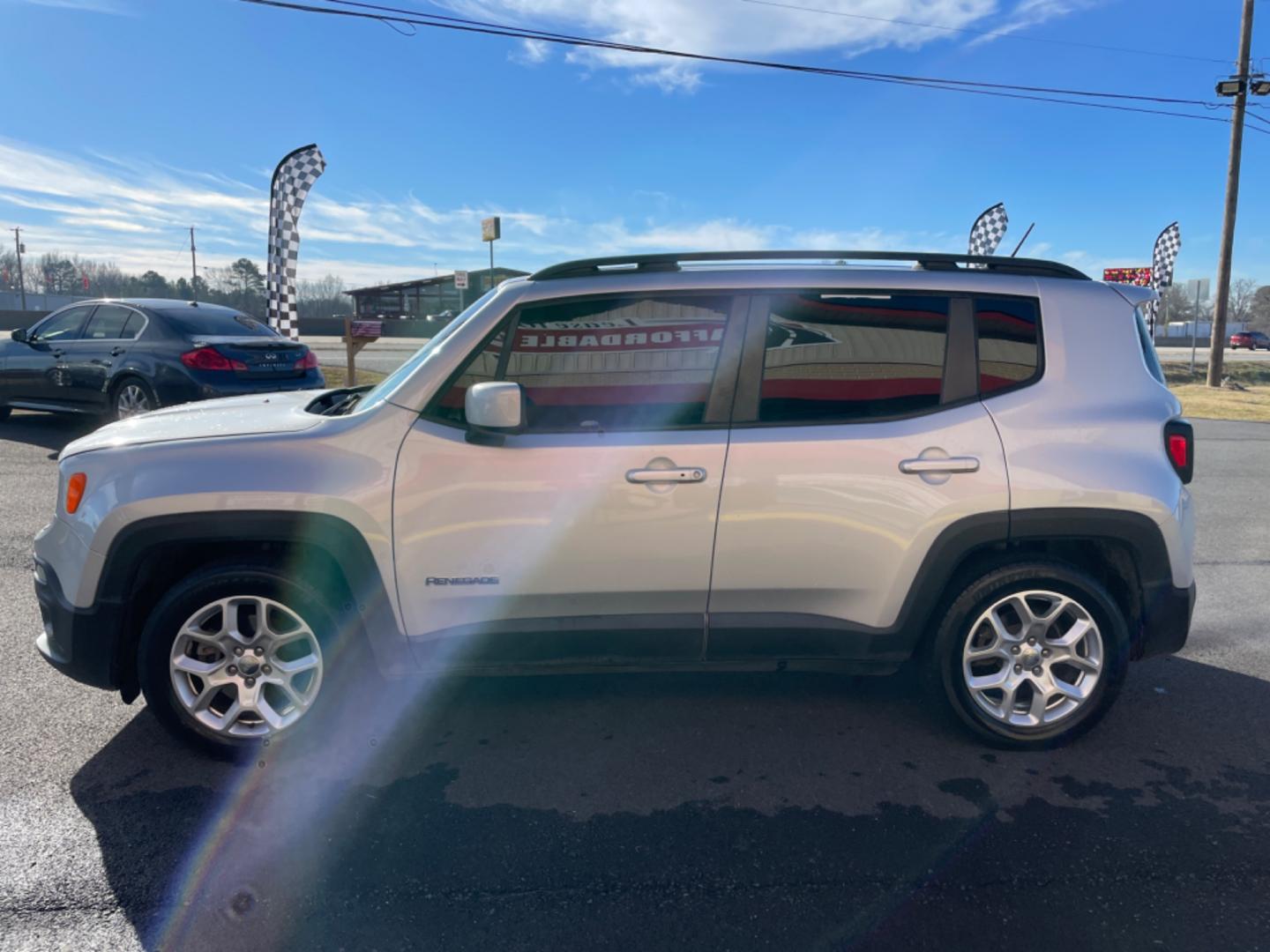 2016 Silver Jeep Renegade (ZACCJABT4GP) with an 4-Cyl, MultiAir, 2.4L engine, Automatic, 9-Spd transmission, located at 8008 Warden Rd, Sherwood, AR, 72120, (501) 801-6100, 34.830078, -92.186684 - Photo#4